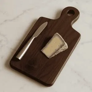 A product photo of Walnut Cheese Board from Bow River Woodworks.