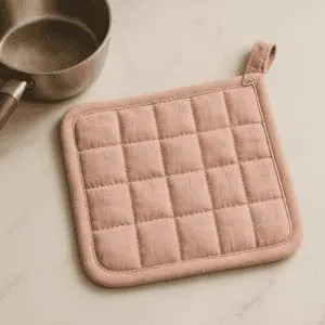 A product photo of Quilted Potholder from Hearthcraft Linens.