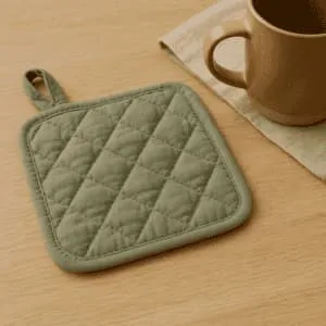 A product photo of Quilted Potholder from Hearthcraft Linens in the Sage colour.
