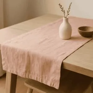 A product photo of Linen Table Runner from Hearthcraft Linens in the Blush colour.