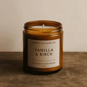 A product photo of Soy Candle (Glass Jar) from Summit & Flame Co. in the 'Vanilla + Birch' scent.