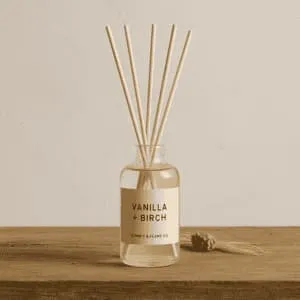 A product photo of Reed Diffuser from Summit & Flame Co. in the 'Vanilla + Birch' scent.