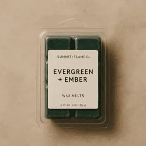 A product photo of Soy Wax Melts from Summit & Flame Co. in the 'Evergreen + Ember' scent.