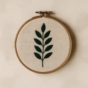 A product photo of Embroidered Hoop Art from Thimble & Thicket featuring the 'Leaf & Branch' motif.